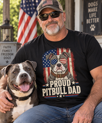 Load image into Gallery viewer, Proud Pitbull Dad patriotic black T-shirt worn by a man sitting with a pit bull